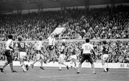 Paul Price heads for goal