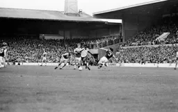 Godfrey Ingram rides a tackle