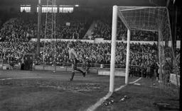 Crowd celebrating David Moss penalty