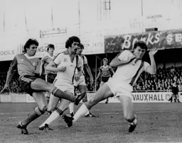 Mal Donaghy and Mike Saxby are unable to prevent Blues' Keith Bertschin opening the scoring