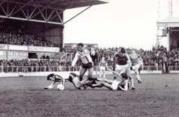 Brian Stein tries to battle through the Wrexham defence