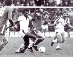 Ricky Hill attempts to nick the ball