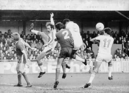 David Moss heads towards goal