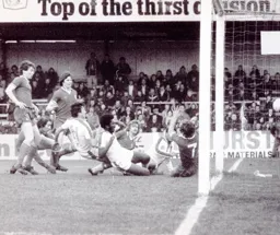 Luton players slide in