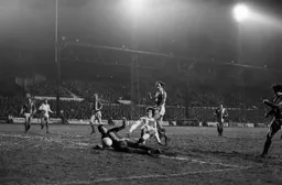 Steve White on as sub chips the defender