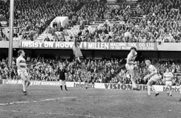 Brian Stein up high to head the ball home