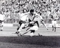 Brian Stein hurdles a Charlton defender