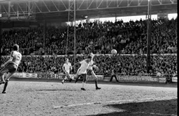 Brian Stein heads for goal