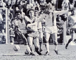 Ricky Hill and Kirk Stephens make sure they win the ball