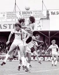 Mal Donaghy makes sure the Derby forwards can't get to the ball