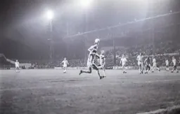 Mike Saxby heads for goal