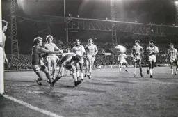 City Keeper Joe Corrigan punches the ball away