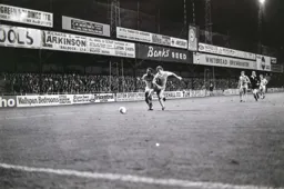 Ricky Hill goes round the defender