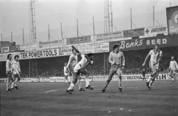 Ricky Hill shoots from inside the box