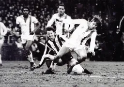 Alan West wins the ball