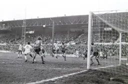 Ricky Hill gets his head to the ball in Rovers box