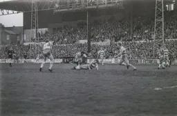 Ricky Hill about to be sandwiched