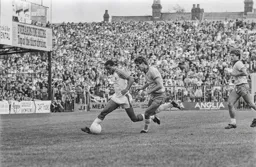 Brian Stein rounds the defender