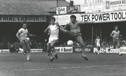 Steve White battles for the ball