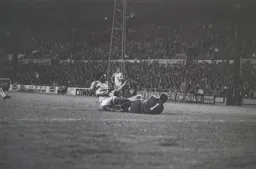 Ricky Hill crashes into the Cardiff keeper