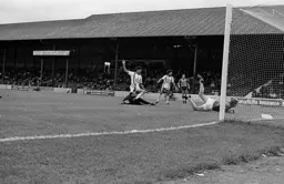 Mark Aizlewood's defelcted shot enters the net for the first goal