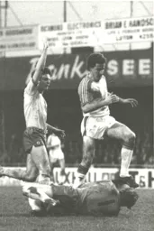 Steve White hurdles the Swindon goalkeeper