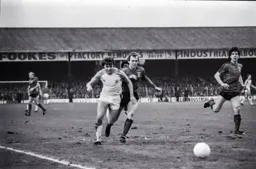 Mal Donaghy chases the ball into the box
