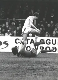 Steve White hurdles the Latics goalkeeper