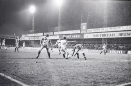 Steve White tries to nick the ball from the keeper