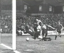 Steve White scrambles in goal number two