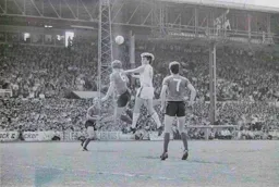 Mal Donaghy heads towards goal