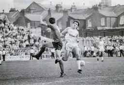 Steve White goes past the ball