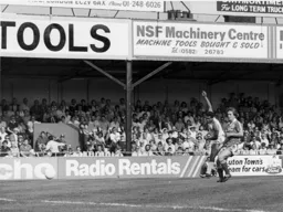 Brian Stein tries his luck from the edge of the penalty area