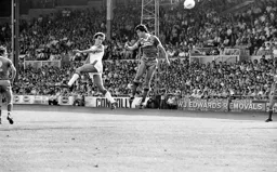 Richard Money heads for goal