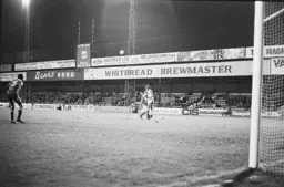 Richard Money heads back across the box