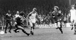 Paul Wash takes on the Arsenal defence