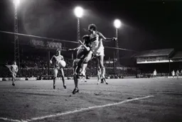 Billy Kellock above the Blackpool defence