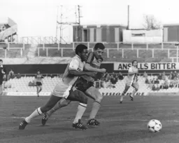 David Moss fights for possession