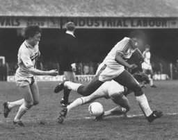 The referee daren`t look as Ricky Hill avoids a tackle