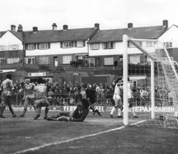 Future Town player Steve Foster looks a bit unhappy after an own goal puts Town 2-0 in front