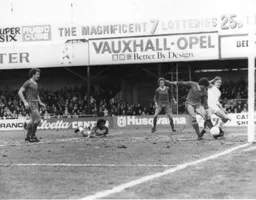 Mark Lawrenson clears from Paul Walsh
