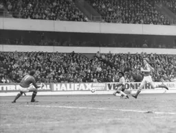 Ricky Hill scores the only goal of the game