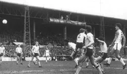 Ricky Hill heads the ball goalwards but no result