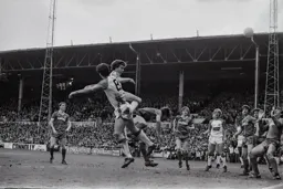 Mal Donaghy heads powerfully towards goal