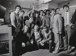 A happy squad with their Manager