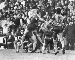 Glum looking City fans as Town`s players celebrate the goal