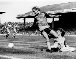 Ray Ranson nicks the ball away from Paul Walsh