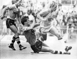 Paul Walsh skips past John Pender