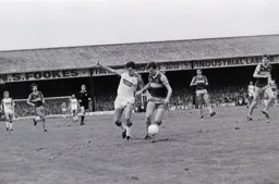 Trevor Aylott tries to get past Alvin Martin