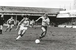 Frankie Bunn takes on a Watford defender
